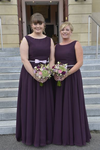Bridesmaids in a rich aubergine with lilac belt detail